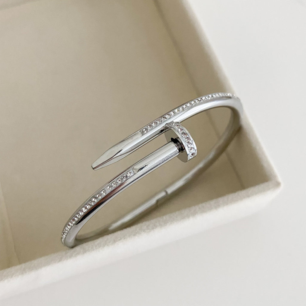 Stainless Steel Gold Plated Anti Tarnish AD Studded Nail Bracelet for Women