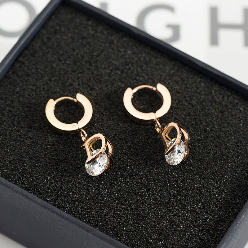 The letter D zircon titanium Steel Rose Gold pop earrings for women