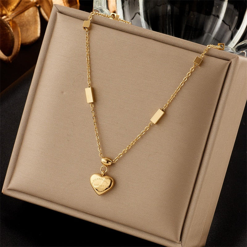 Exquisite Gold-Tone Heart Pendant Necklace in Stainless Steel A Fashionable Gift of Love and Style for Women, Ladies, and Girls