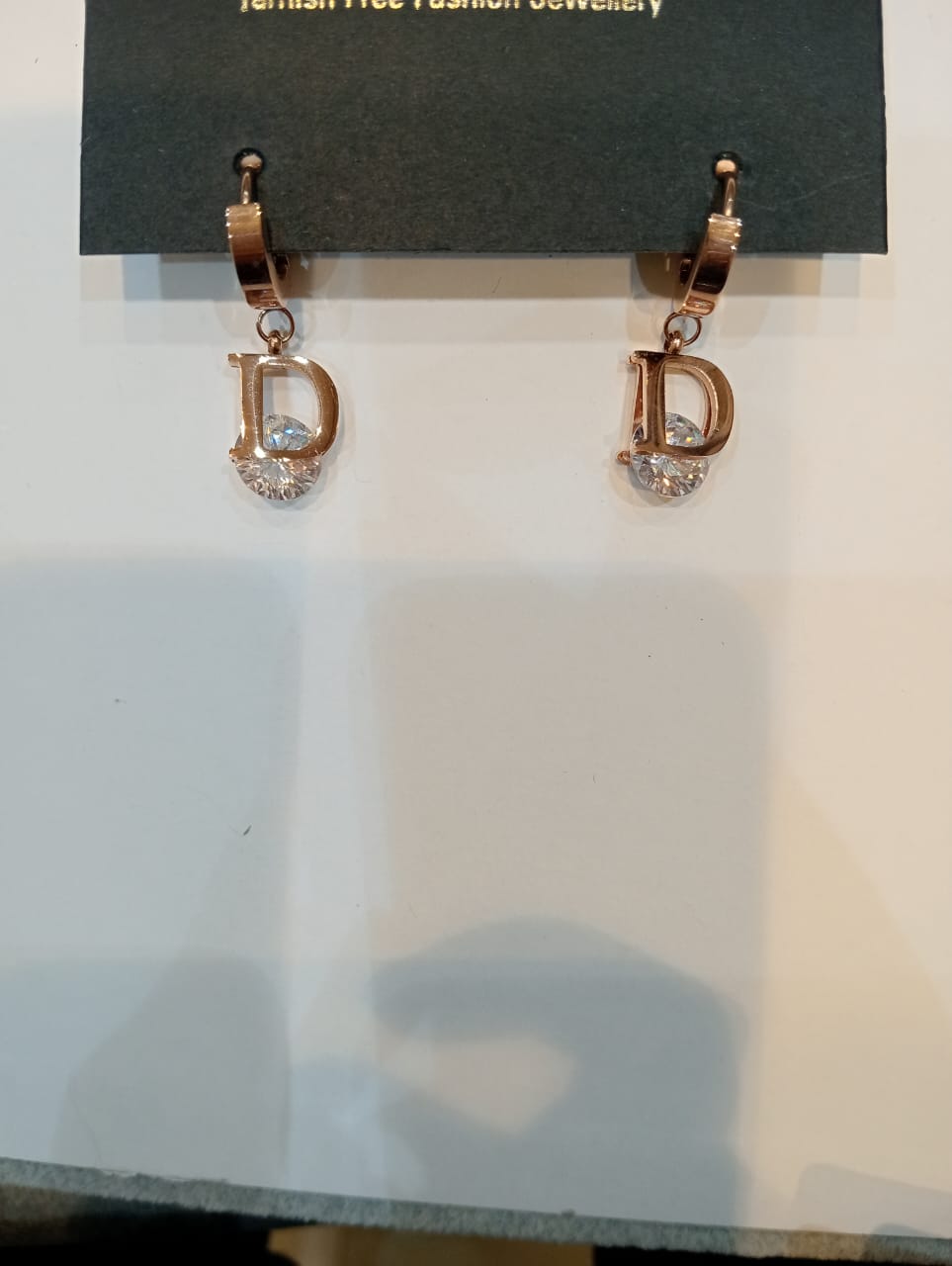 The letter D zircon titanium Steel Rose Gold pop earrings for women